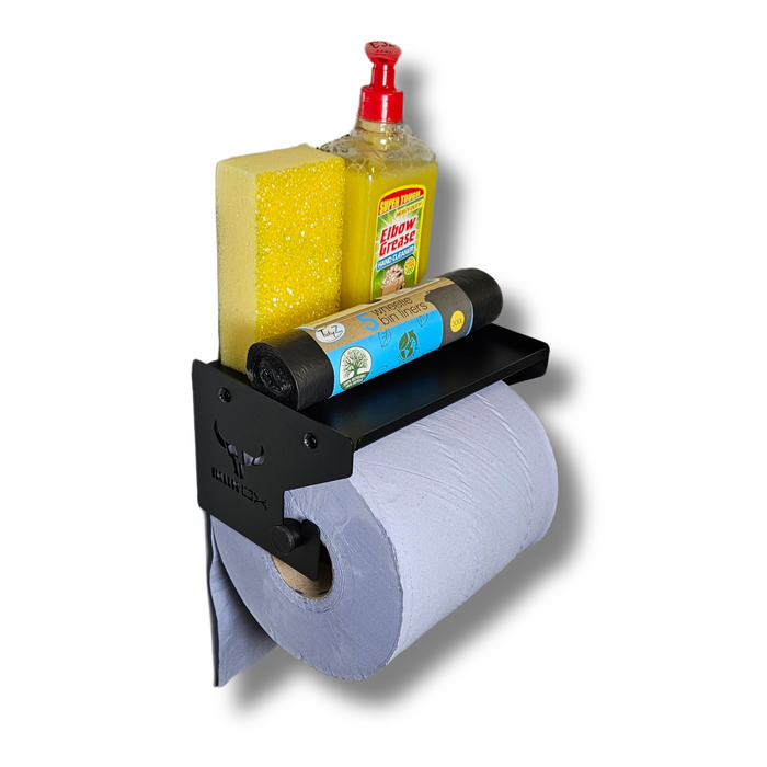 The Blue Roll Holder & Dispenser is a wall-mounted holder with a durable finish, featuring spaces for paper towels, a sponge, dish soap, and includes a black roll of garbage bags on top, all set against a white background.