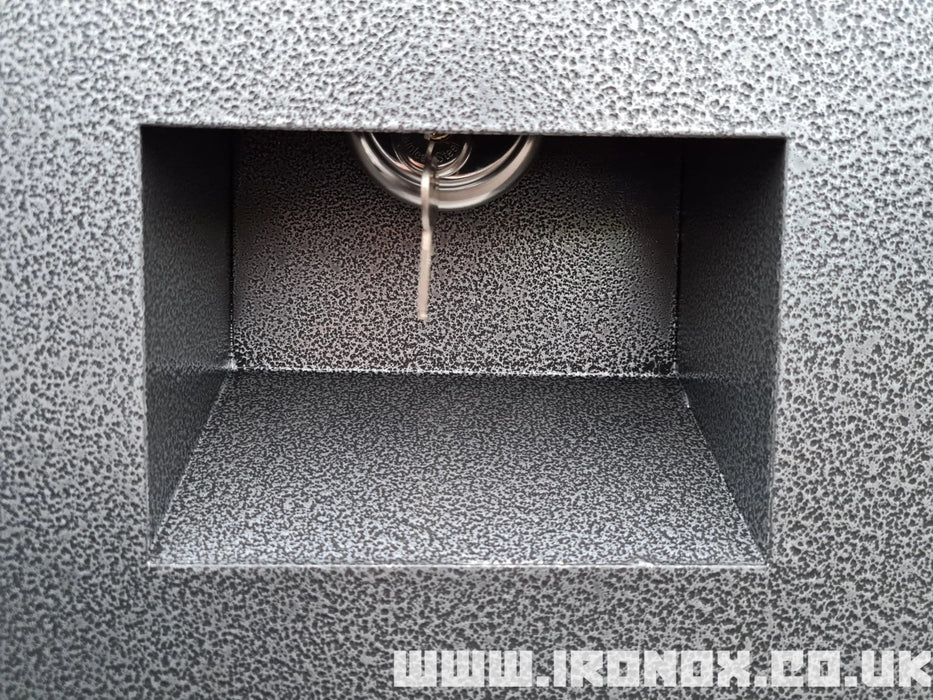 A Heavy duty Iron Ox® 48" Steel Job Site Tool box with a key in it.
