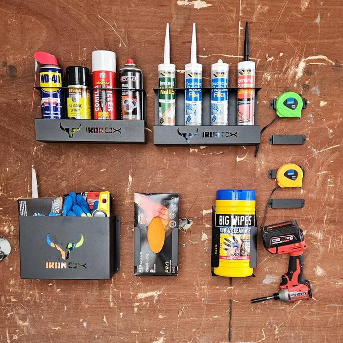 Organized workshop wall with various maintenance supplies and tools neatly arranged on mounted shelves and holders, including a Tape Measure Holder - 5 Pack for easy access.