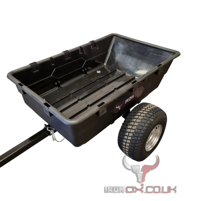 A black Iron Ox® Haul 10 - Tipping Trailer 1500lb with a tire on it.