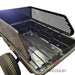 A black Iron Ox® Haul 10 - Tipping Trailer 1500lb with a mesh basket.