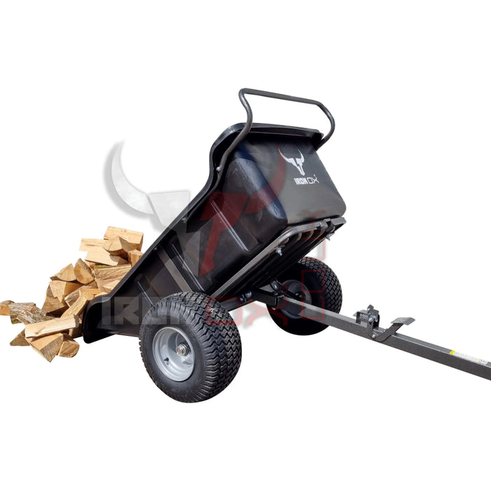 An Iron Ox® Haul 12 - Tipping Trailer 1200lb with logs on it.