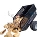 An Iron Ox® Haul 10 - Tipping Trailer 1500lb loaded with firewood logs.