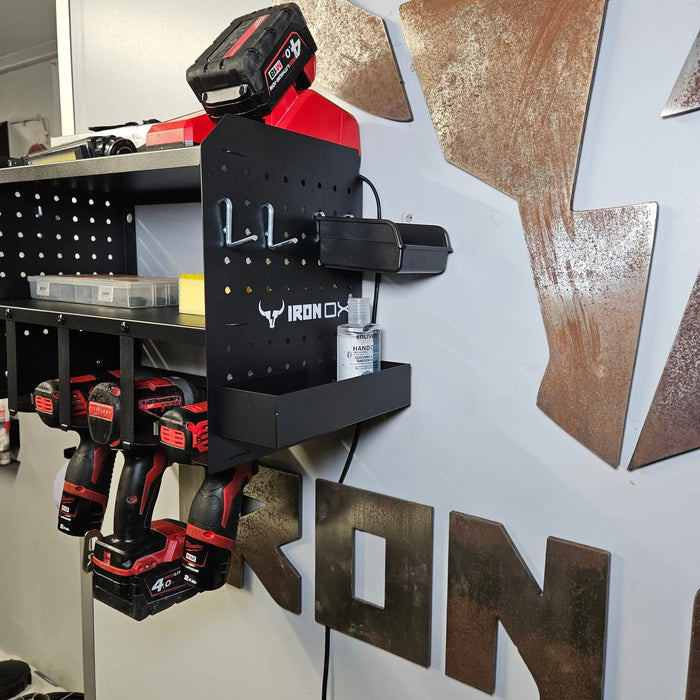 A precision laser cutting Power Tool Storage Rack - With Accessories with several tools on it.
