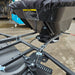 A trailer hitch with a protective cover, showing a safety chain and an electrical connection in place, designed for an ATV Quad Bike Seed Feed Fertiliser Spreader 12V.