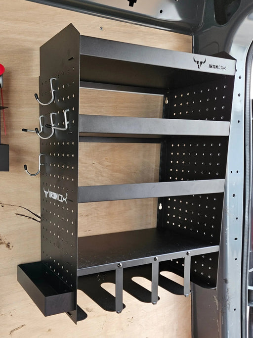 The Van Racking Drill & Accessory Shelf for Garages and Workshops is a black metal storage unit that mounts on the wall and features shelves, hooks, and compartments for efficient organization of power tools in your garage.