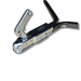 Close-up of a Lawn Roller 60" with a handle, mounted on a metal frame against a black background, showcasing universal hitch compatibility.