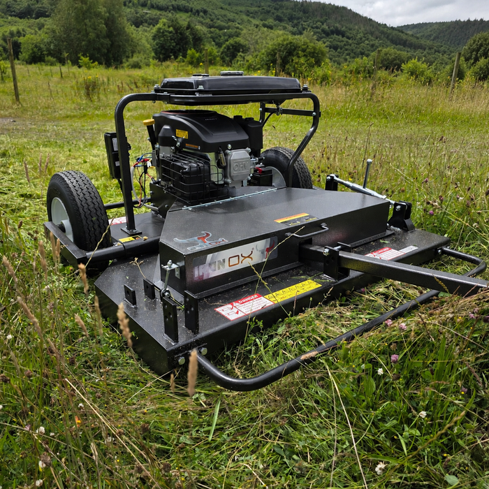 Close-up of an Iron Ox HD450 three-blade tow behind topper mower built for durable field maintenance.