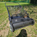Close-up of 26-inch yard sweeper with large wheels and durable frame