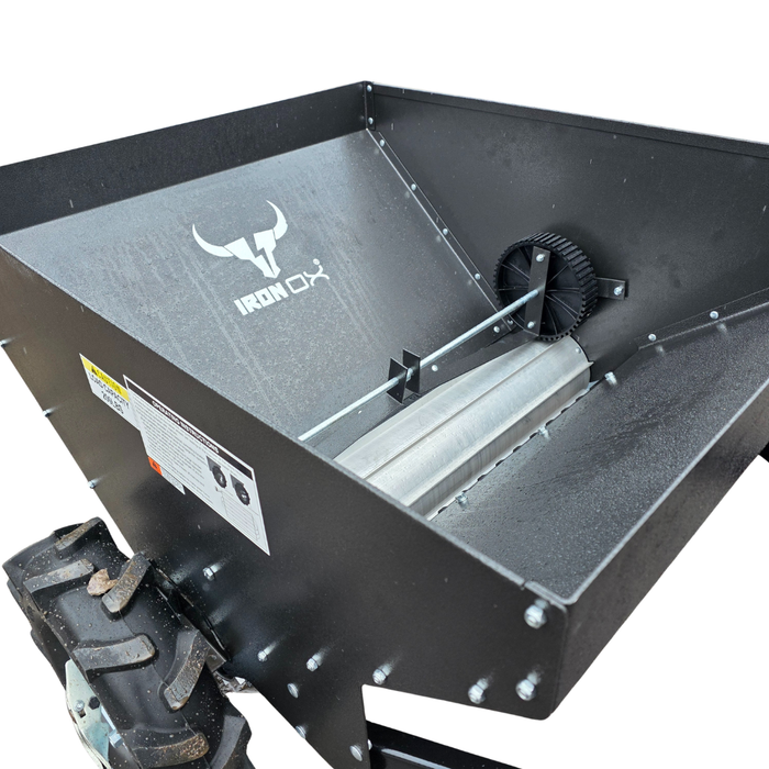 Rear spreading system of tow behind muck spreader designed for even fertiliser and manure distribution