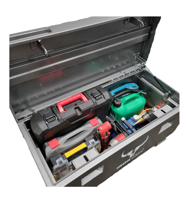 A Job Site Tool Box Vault filled with a variety of tools.