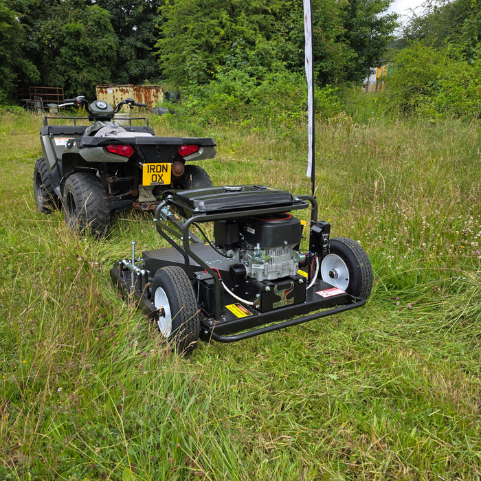 Three-blade ATV topper mower mowing a horse paddock with an even finish.