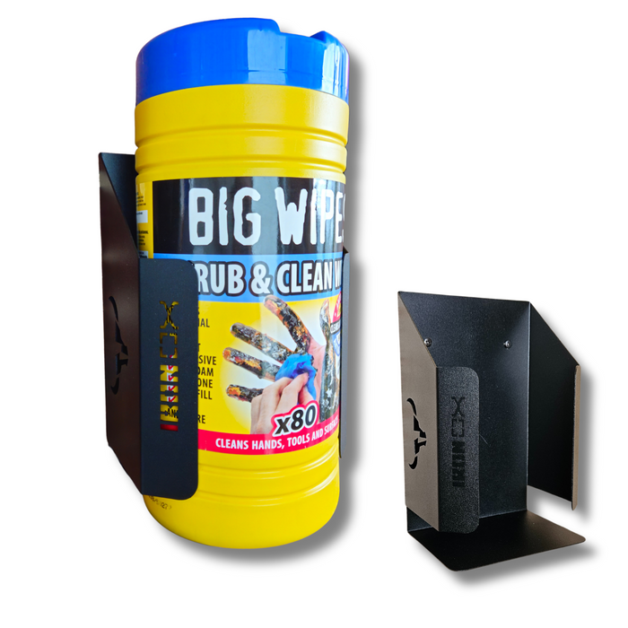 A container labeled "Big Wipes Scrub & Clean" with a sleek, black Wipe Dispenser Holder designed to secure the container, offering a universal fit.