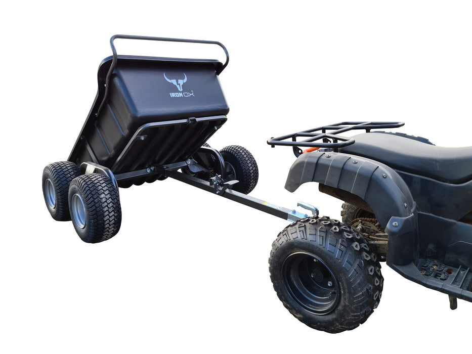 A black quad bike with an ATV Tipping Trailer - Iron Ox Haul 15 - 4 Wheel Trailer attached to it.