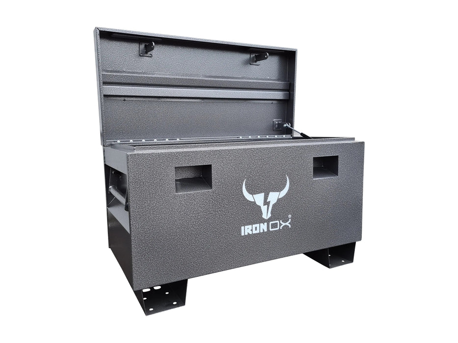 A black Steel Job Site Tool box Iron Ox with a bull on it.