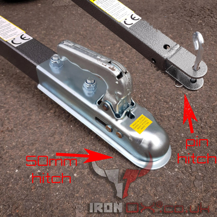 A picture of an ATV Tipping Trailer - Iron Ox Haul 15 and a quad bike tyre on the ground.