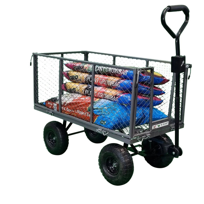 A Garden Trolley Cart -G-Kart MT600H 300KG with a load of bags on it.