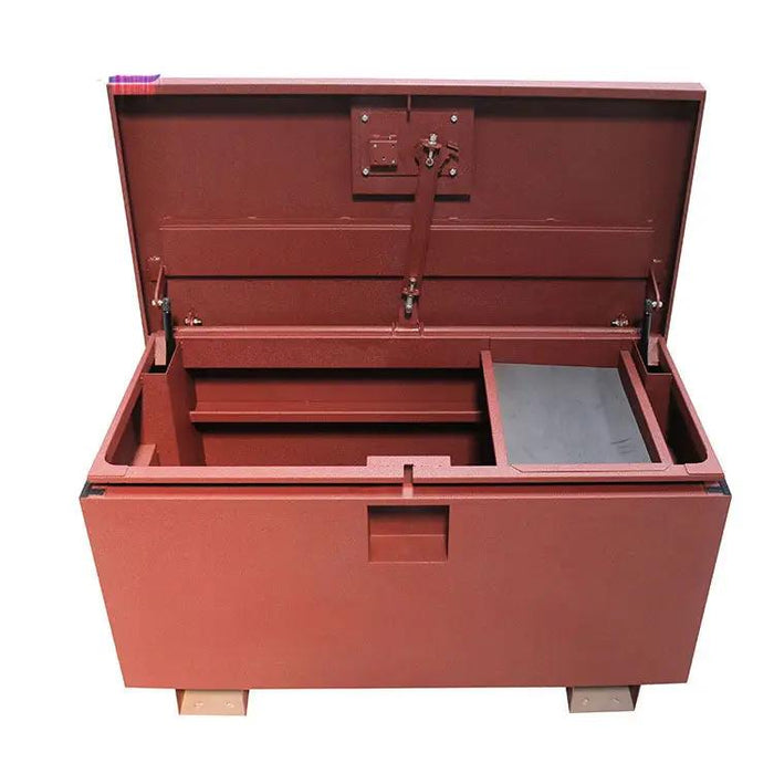 A heavy duty red powder coated Van Steel Box with a lid on it.