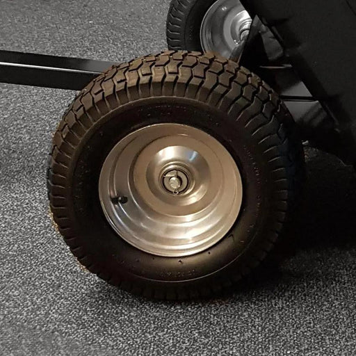 An image of a Titan 3.0 Wheel & Tyre on a wheeled cart.